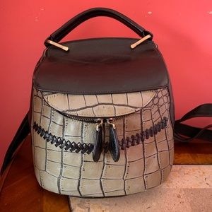 Crocodile-embossed leather backpack